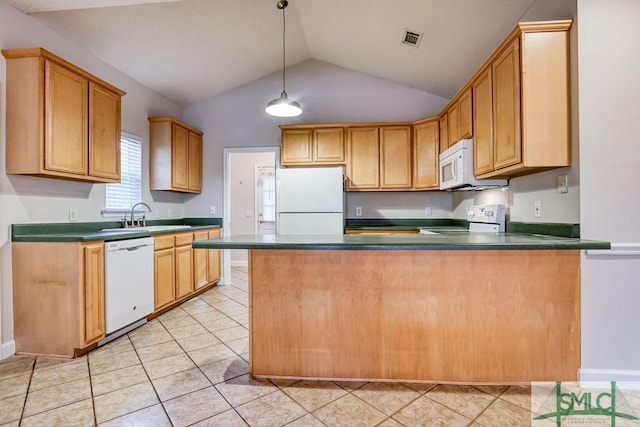 kitchen featuring white appliances, light tile patterned floors, sink, lofted ceiling, and kitchen peninsula