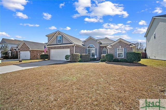 view of front of home with concrete driveway, brick siding, an attached garage, and a front yard