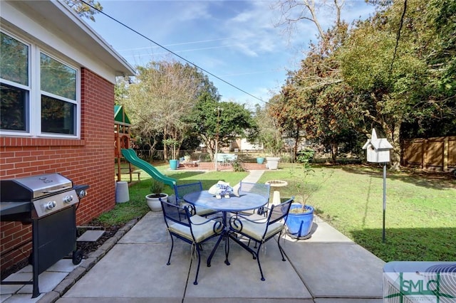 view of patio featuring a playground