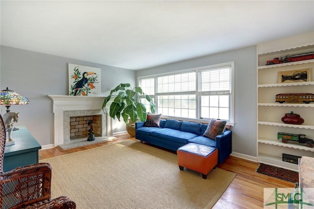 living room with light hardwood / wood-style flooring