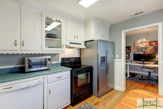 kitchen with light wood-type flooring, black electric range, white cabinets, and dishwasher