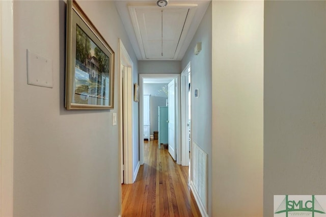 hallway with light wood-type flooring