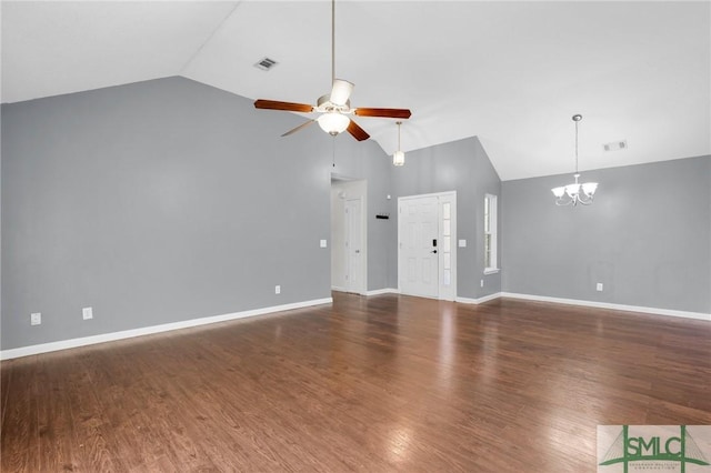 unfurnished living room featuring high vaulted ceiling, dark hardwood / wood-style flooring, and ceiling fan with notable chandelier