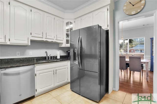 352 Harbour Ln, Richmond Hill, GA 31324 - kitchen featuring a sink, stainless steel dishwasher, black fridge with ice dispenser, and ornamental molding