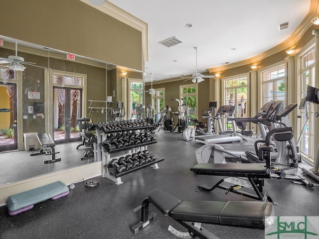 gym with ceiling fan and ornamental molding