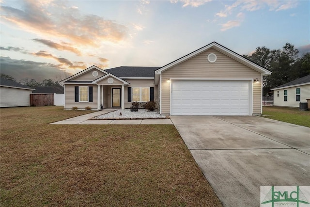 single story home featuring fence, concrete driveway, an attached garage, and a front yard