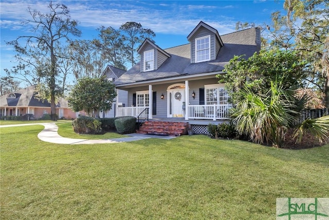 new england style home with a front lawn and covered porch