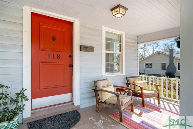 entrance to property with a porch