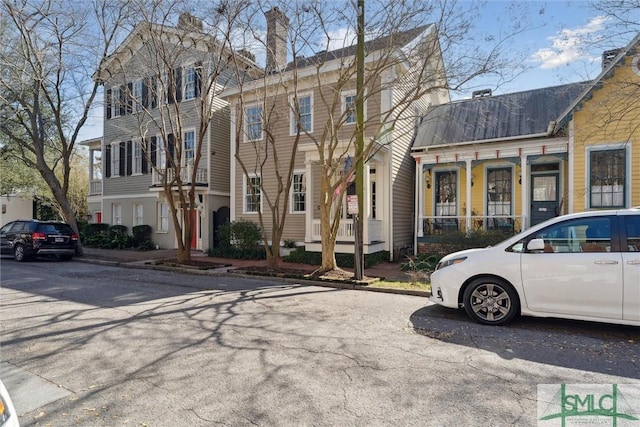 view of front of property with a chimney