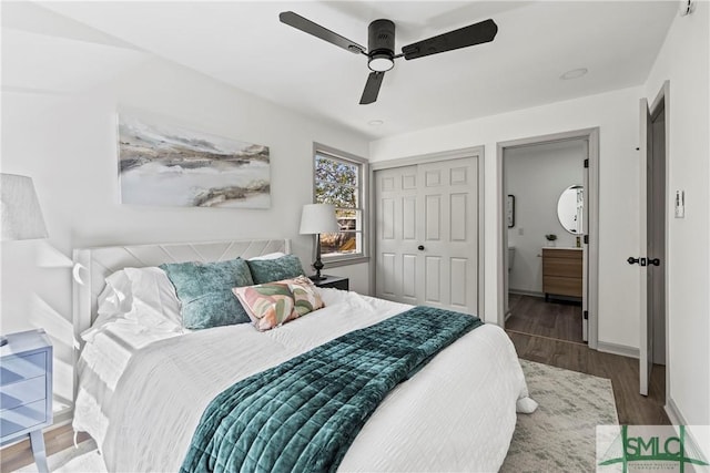 bedroom with wood finished floors, baseboards, a closet, and ceiling fan