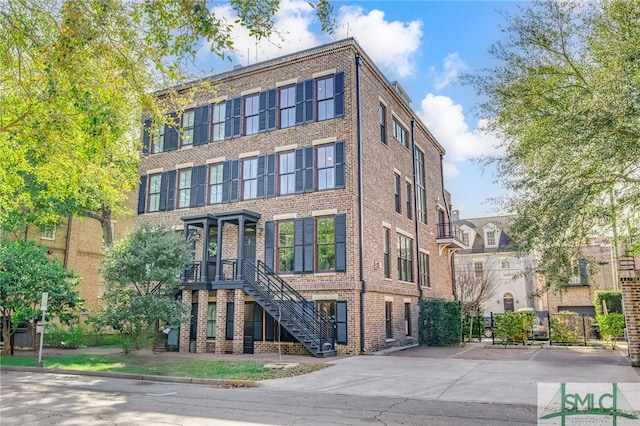 view of property with stairs