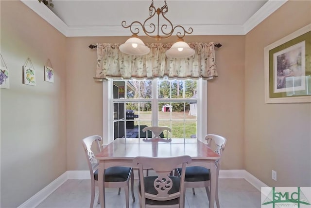 dining area with crown molding, baseboards, and light tile patterned floors