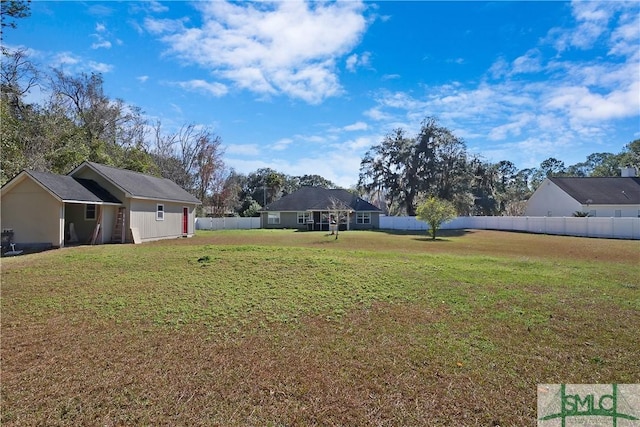 view of yard with fence