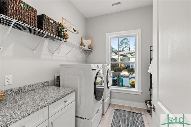 230 Blackjack Oak Dr W, Richmond Hill, GA 31324 - washroom with washer and dryer and light wood-style flooring