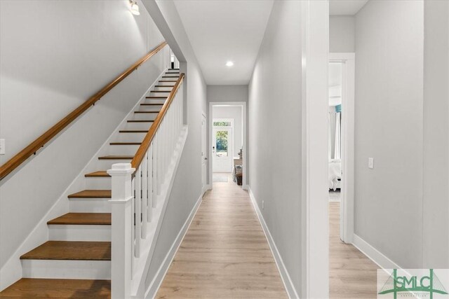 230 Blackjack Oak Dr W, Richmond Hill, GA 31324 - stairs featuring wood finished floors and recessed lighting