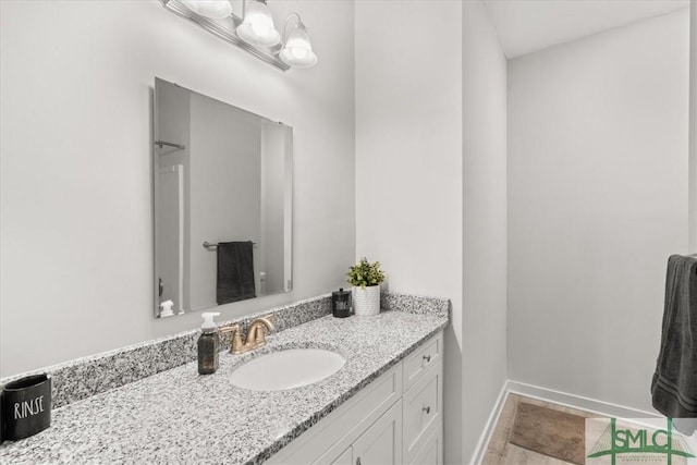 230 Blackjack Oak Dr W, Richmond Hill, GA 31324 - bathroom featuring vanity and baseboards