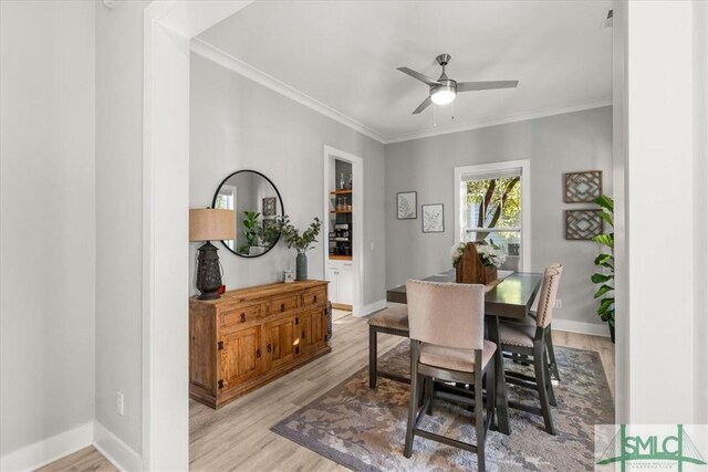 230 Blackjack Oak Dr W, Richmond Hill, GA 31324 - dining space featuring light wood-type flooring, ceiling fan, and ornamental molding