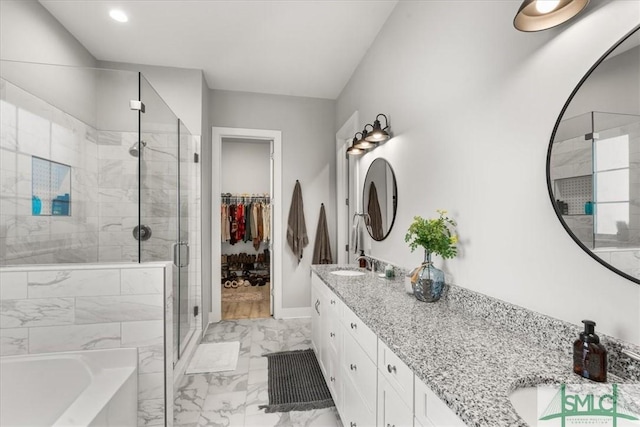 230 Blackjack Oak Dr W, Richmond Hill, GA 31324 - full bath with marble finish flooring, double vanity, a stall shower, a garden tub, and recessed lighting