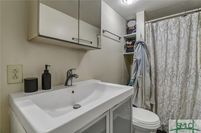 full bathroom with a sink and toilet