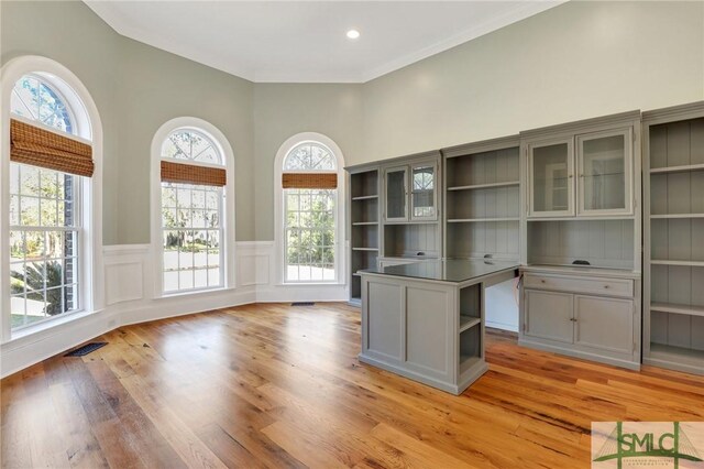 106 Commodore Dr, Savannah, GA 31410 - unfurnished office featuring a wainscoted wall, visible vents, recessed lighting, a decorative wall, and light wood-type flooring