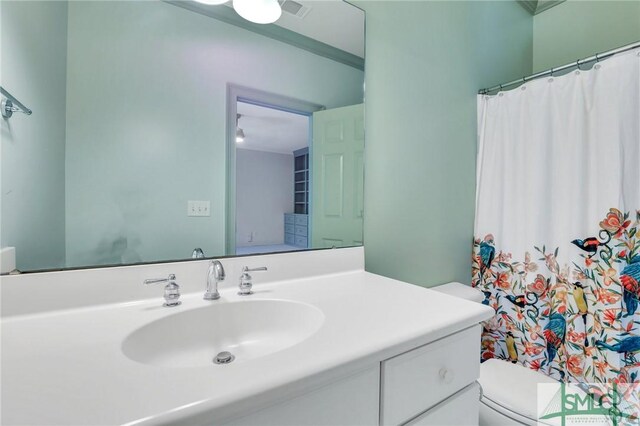 106 Commodore Dr, Savannah, GA 31410 - full bathroom with vanity, a shower with shower curtain, toilet, and visible vents
