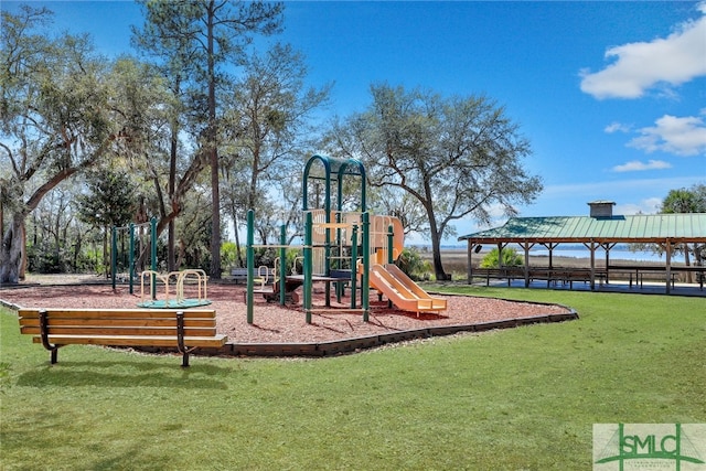 community jungle gym featuring a lawn