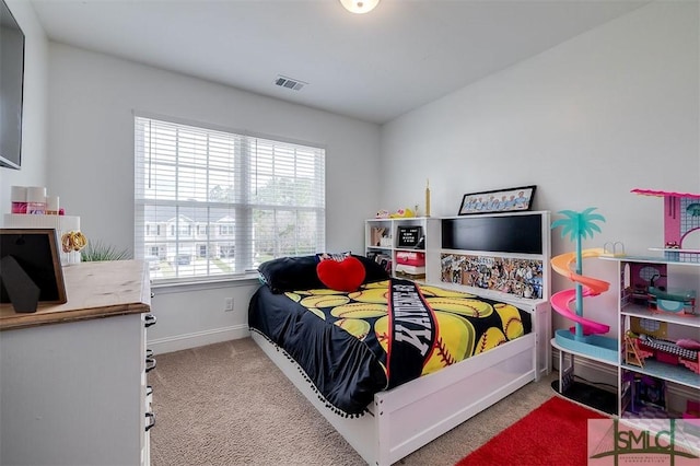 bedroom featuring carpet, visible vents, and baseboards