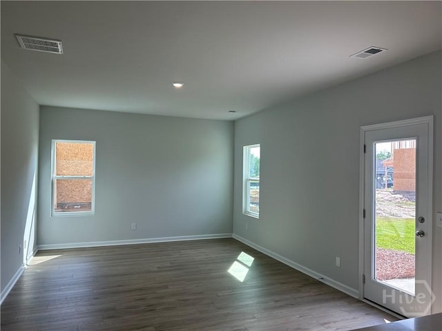 108 Stillhouse Dr, Springfield, GA 31329 - unfurnished room with plenty of natural light, dark wood-style flooring, and recessed lighting