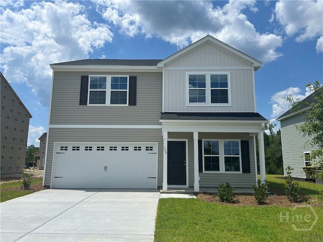 108 Stillhouse Dr, Springfield, GA 31329 - view of front of home featuring concrete driveway, an attached garage, a porch, and a front lawn