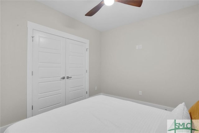 bedroom with a closet and ceiling fan