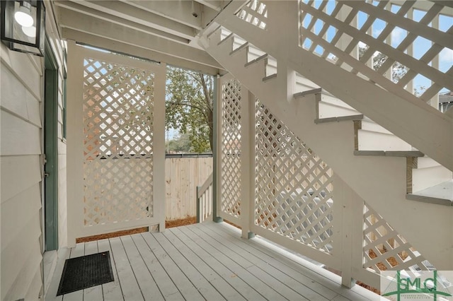 unfurnished sunroom with healthy amount of natural light