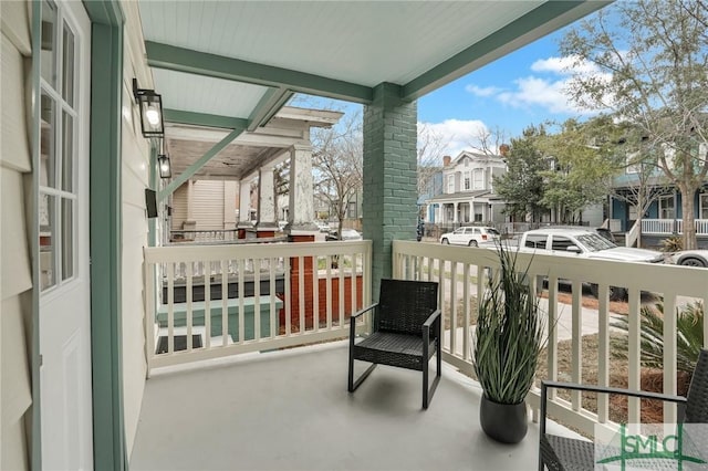 balcony featuring a residential view