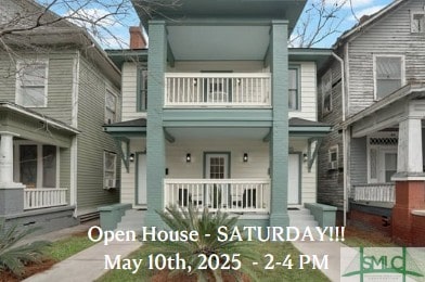 multi unit property featuring a balcony and a porch