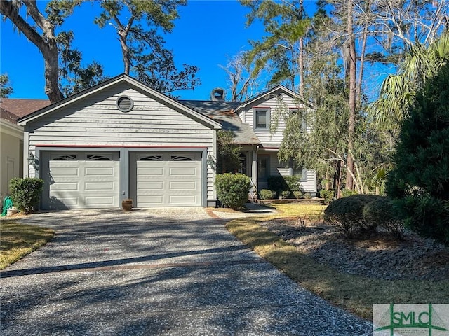 view of front of home featuring driveway and an attached garage