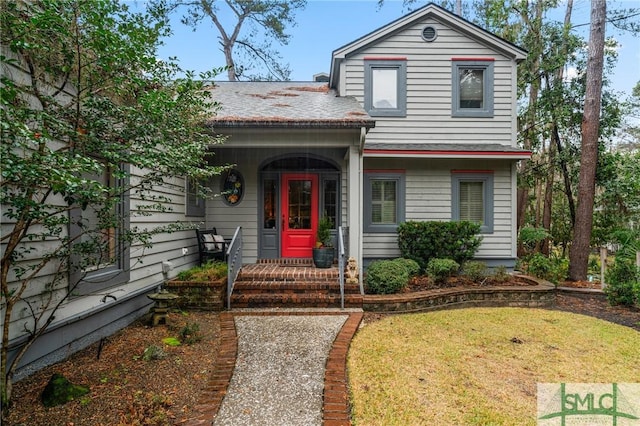 view of front of house with a front lawn