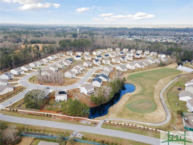 birds eye view of property featuring a residential view and a water view