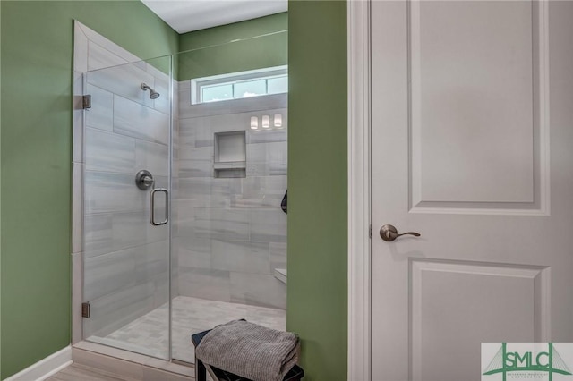 bathroom featuring a stall shower