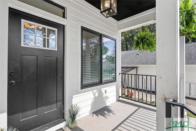 entrance to property featuring a balcony