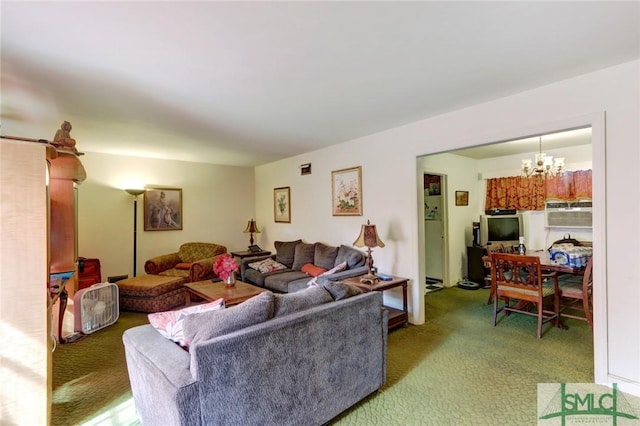 living area featuring a chandelier and carpet