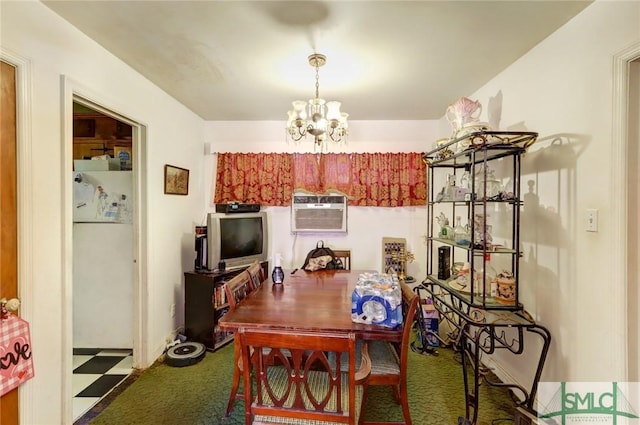 dining space featuring an inviting chandelier, dark floors, and a wall mounted AC