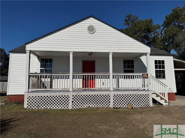 view of front of home featuring covered porch