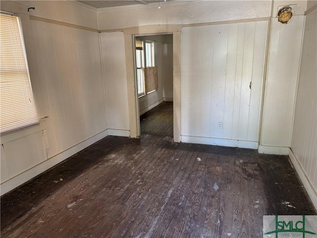 spare room featuring hardwood / wood-style flooring