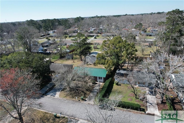 birds eye view of property with a residential view