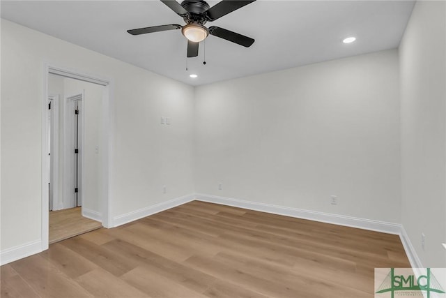 empty room with light wood-type flooring, ceiling fan, baseboards, and recessed lighting