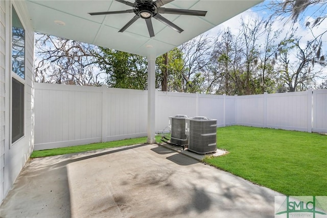 view of patio / terrace featuring a ceiling fan, a fenced backyard, and central AC unit