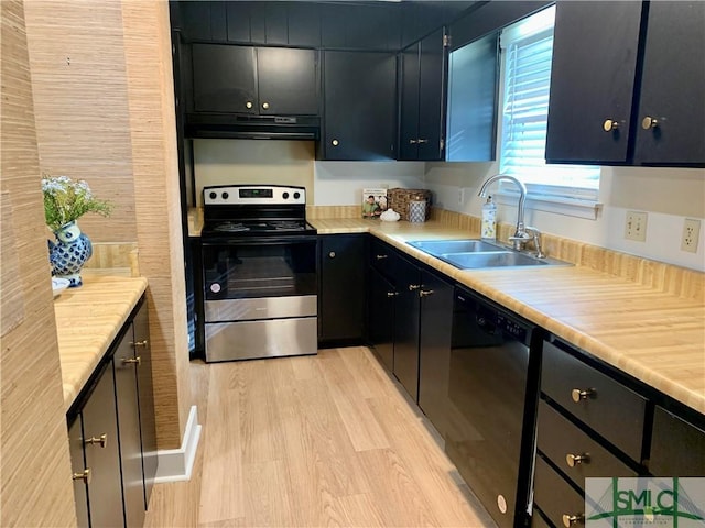 kitchen with electric stove, black dishwasher, light countertops, and under cabinet range hood