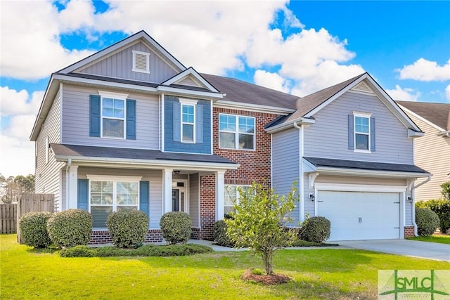 view of front of house featuring brick siding, board and batten siding, a front yard, a garage, and driveway