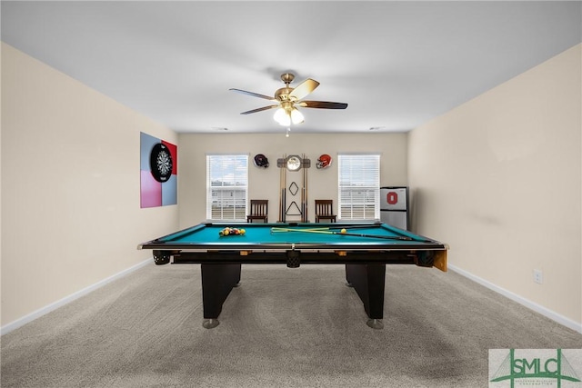 game room with carpet floors, baseboards, and a ceiling fan