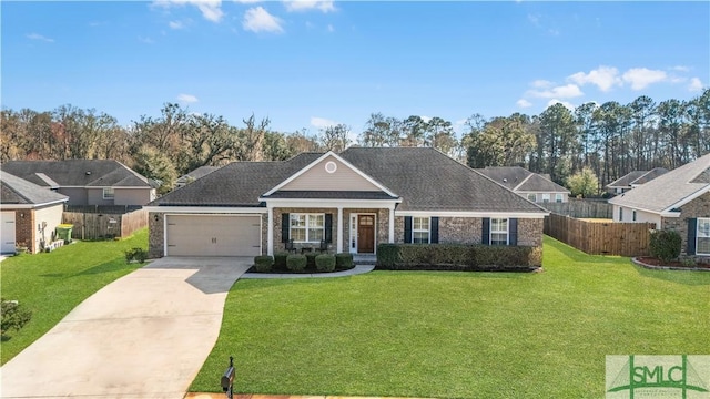 view of front of house with concrete driveway, fence, and a front lawn