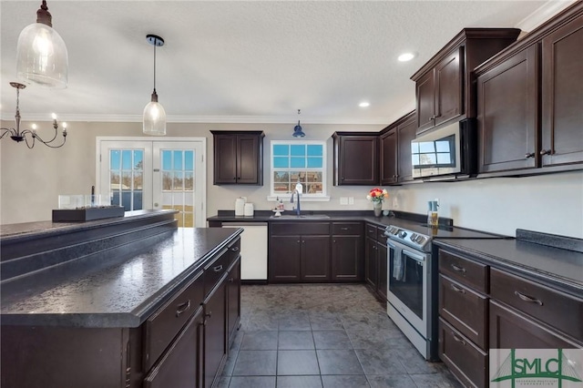 469 Nashview Trl, Allenhurst, GA 31301 - kitchen with dark countertops, appliances with stainless steel finishes, pendant lighting, and a sink